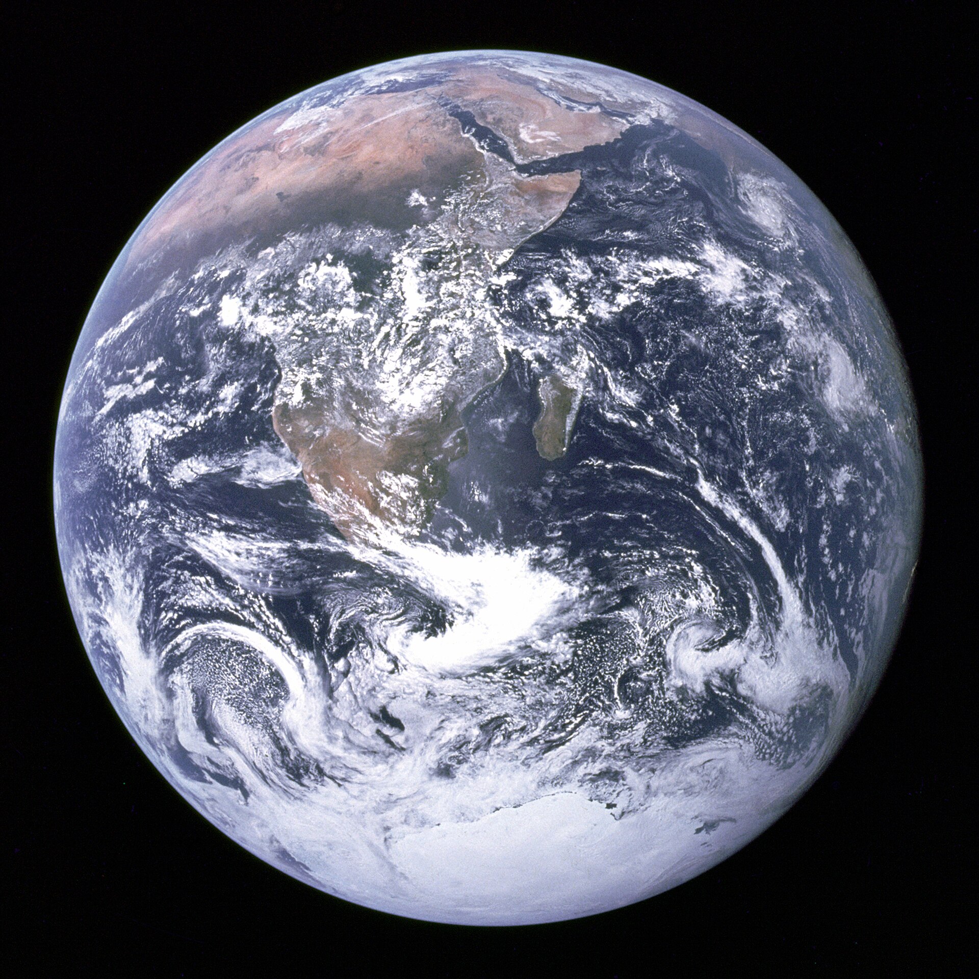 Cinematic photo of planet Earth from space, glowing with a soft atmosphere